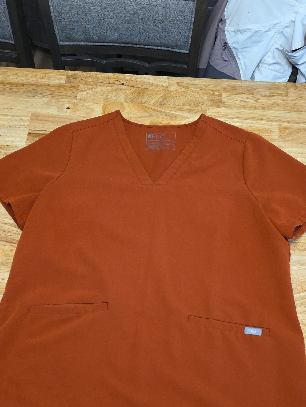 FIGS Women's V-Neck Scrub Top in Rust Orange
